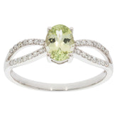 Green Peridot 14K White Gold Ring with Diamond Accent, elegant and sparkling jewelry piece.